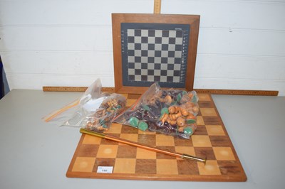 Lot 190 - Large chess board, further board and chess pieces