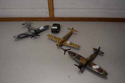 Lot 105 - Three Dinky toy aeroplanes and a scout car