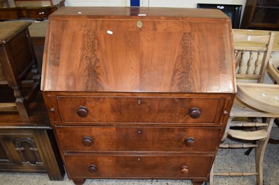 Lot 307 - A bureau with three drawers below, 91cm wide