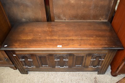 Lot 309 - Reproduction pine coffer with carved front,...