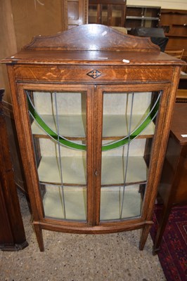 Lot 344 - An Edwardian bow fronted display cabinet with...