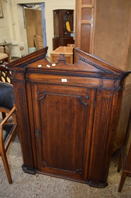 Lot 345 - Oak corner cupboard with carved columns to...