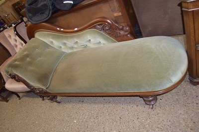 Lot 351 - Mahogany chaise longue with green velvet...