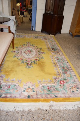 Lot 367 - Large yellow ground modern Chinese rug, approx...