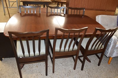 Lot 377 - A reproduction twin pedestel extending dining...