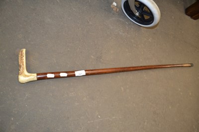 Lot 761 - An antler handle walking stick