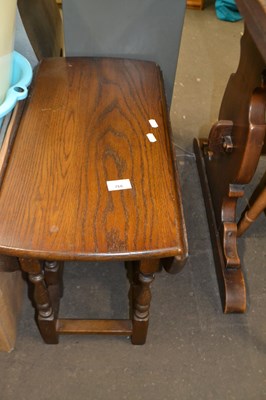 Lot 766 - An oval drop leaf coffee table