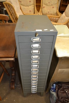 Lot 777 - A tall narrow metal filing cabinet