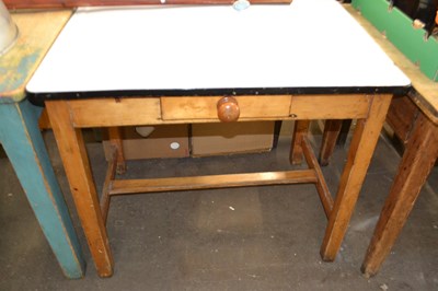 Lot 811 - An enamelled top kitchen table with single...