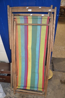 Lot 859 - Two wooden framed folding deckchairs