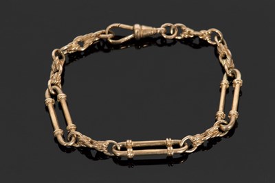 Lot 408 - A 9ct fancy link bracelet, the oval links,...