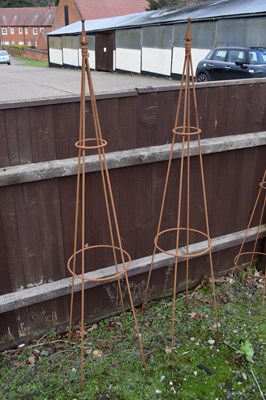 Lot 3 - Pair of metal plant stands with ornate finials,...