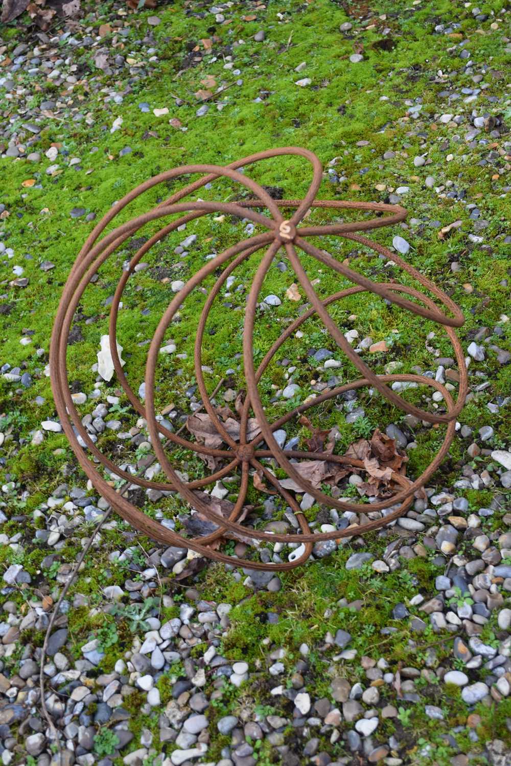 Lot 6 - Metal garden ornament formed as a globe,...