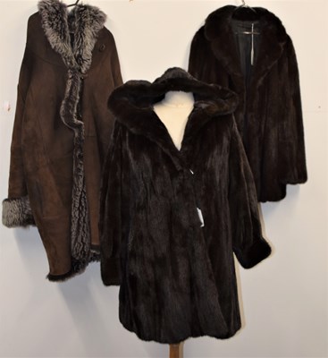 Lot 77 - A lady's mink 3/4 length fur jacket, with...