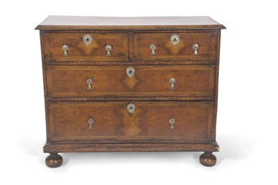 Lot 479 - A Queen Anne walnut and cross banded chest of...
