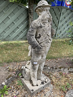 Lot 2 - Composite garden statue formed as a man,...