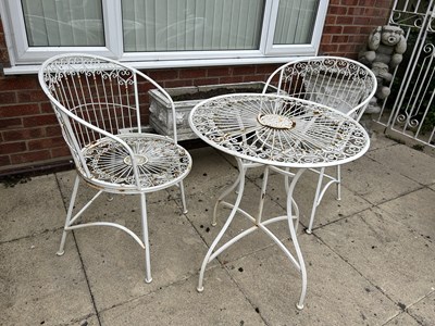 Lot 12 - Decorative metal garden bistro set, table and...