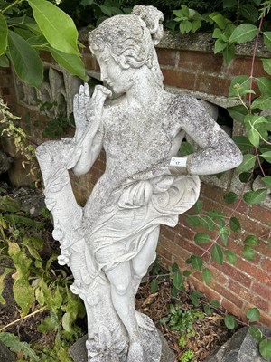 Lot 17 - Composite garden statue formed as a lady,...