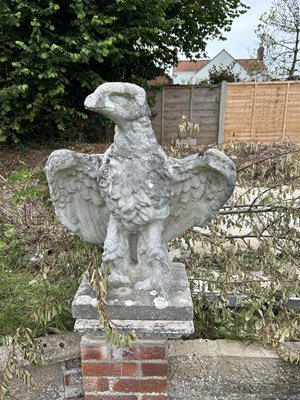 Lot 27 - Composite garden statue formed as an eagle,...