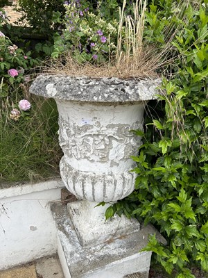 Lot 42 - A pair of matching composite garden urns,...