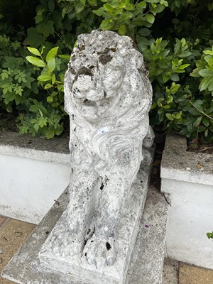 Lot 43 - Pair of composite seated lions, height approx...