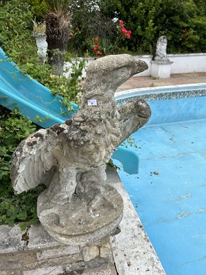 Lot 50 - Composite garden statue, formed as an eagle,...