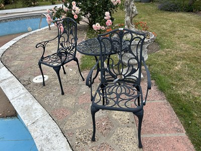 Lot 53 - A decorative metal garden bistro set...