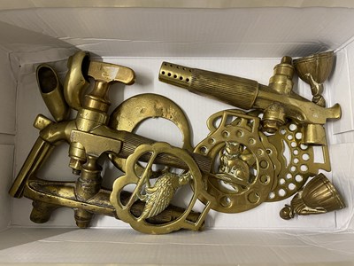 Lot 24 - Box of various brass barrel taps, horse...