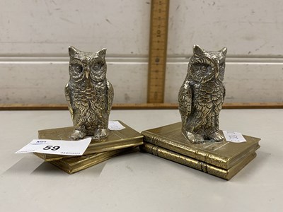 Lot 59 - Pair of small owl formed metal paperweights