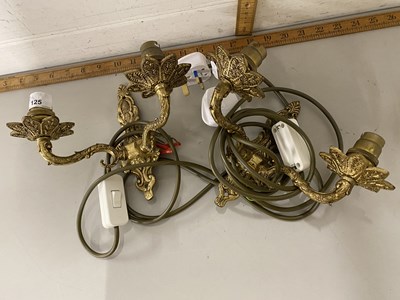 Lot 125 - A pair of double light wall sconces