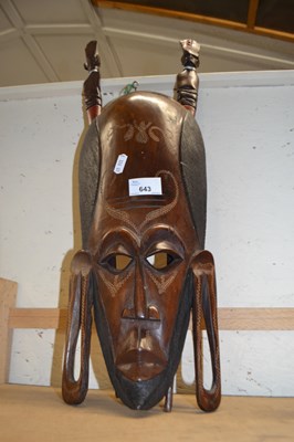 Lot 643 - An African carved wall mask