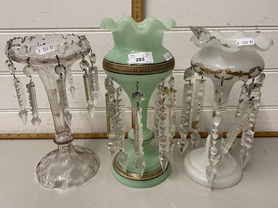 Lot 203 - A group of three various glass table lustre vases