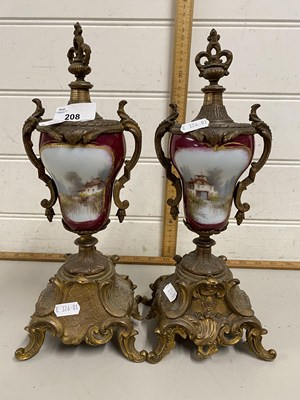 Lot 208 - Pair of continental porcelain and metal...