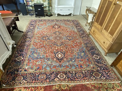 Lot 227 - Large Middle Eastern wool floor rug decorated...