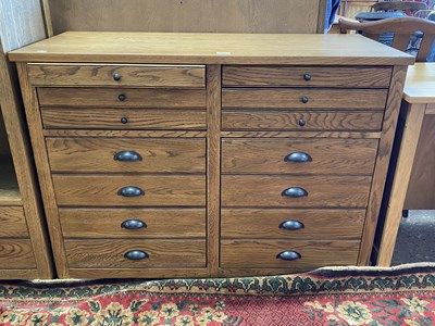 Lot 237 - Modern light oak fourteen drawer chest, 112cm...