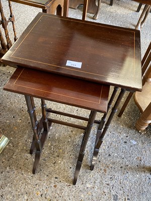 Lot 253 - Two small mahogany nesting tables