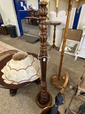 Lot 301 - Two modern turned wooden standard lamps with...