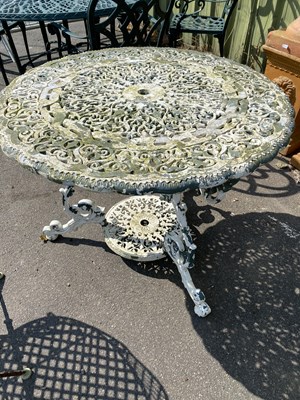 Lot 331 - Cast aluminium garden table with pierced top,...