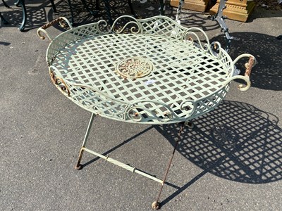 Lot 332 - Small iron garden table with tray formed top,...