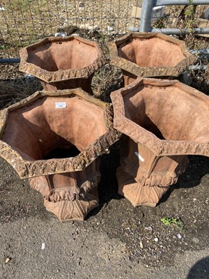 Lot 334 - Set of four octagonal terracotta urns or...