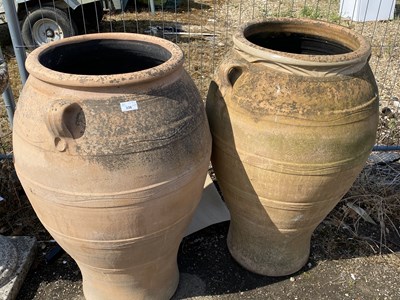 Lot 336 - A near pair of large terracotta olive type...