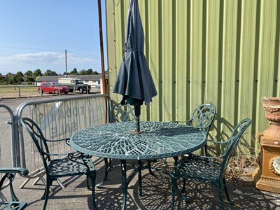 Lot 347 - Modern cast metal garden table with parasol...