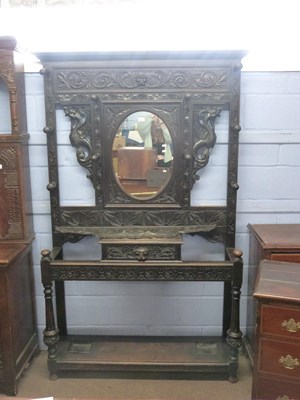 Lot 650 - Late Victorian gothic carved hall stand with...