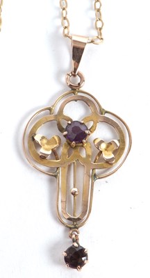 Lot 122 - An Edwardian amethyst and garnet pendant,...