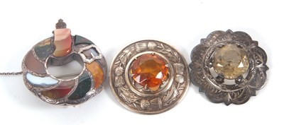 Lot 187 - Three Scottish brooches, to include a silver...