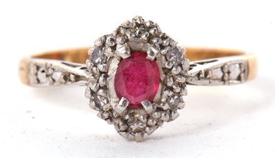 Lot 7 - An 18ct and platinum ruby and diamond ring,...