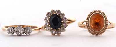 Lot 76 - Three 9ct gemset rings: a 9ct illusion set...