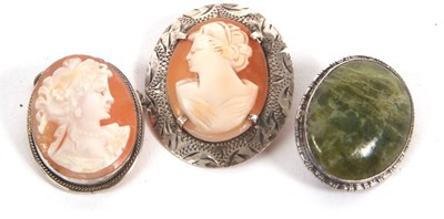 Lot 202 - Two cameos and a brooch: an oval shell cameo...