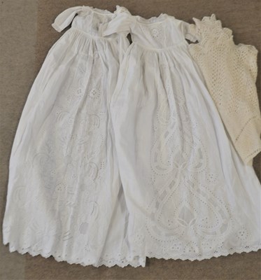 Lot 157 - Two white cotton christening gowns, both with...