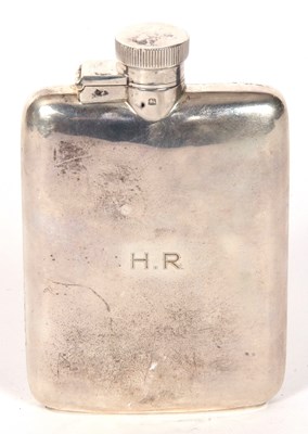 Lot 14 - A spirit flask of plain slightly curved...